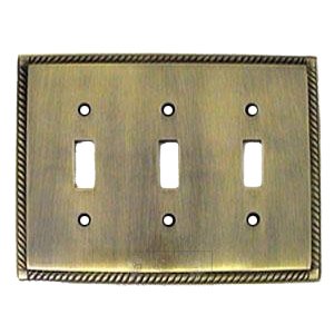 Arlington Triple Toggle Switchplate in Antique Brass