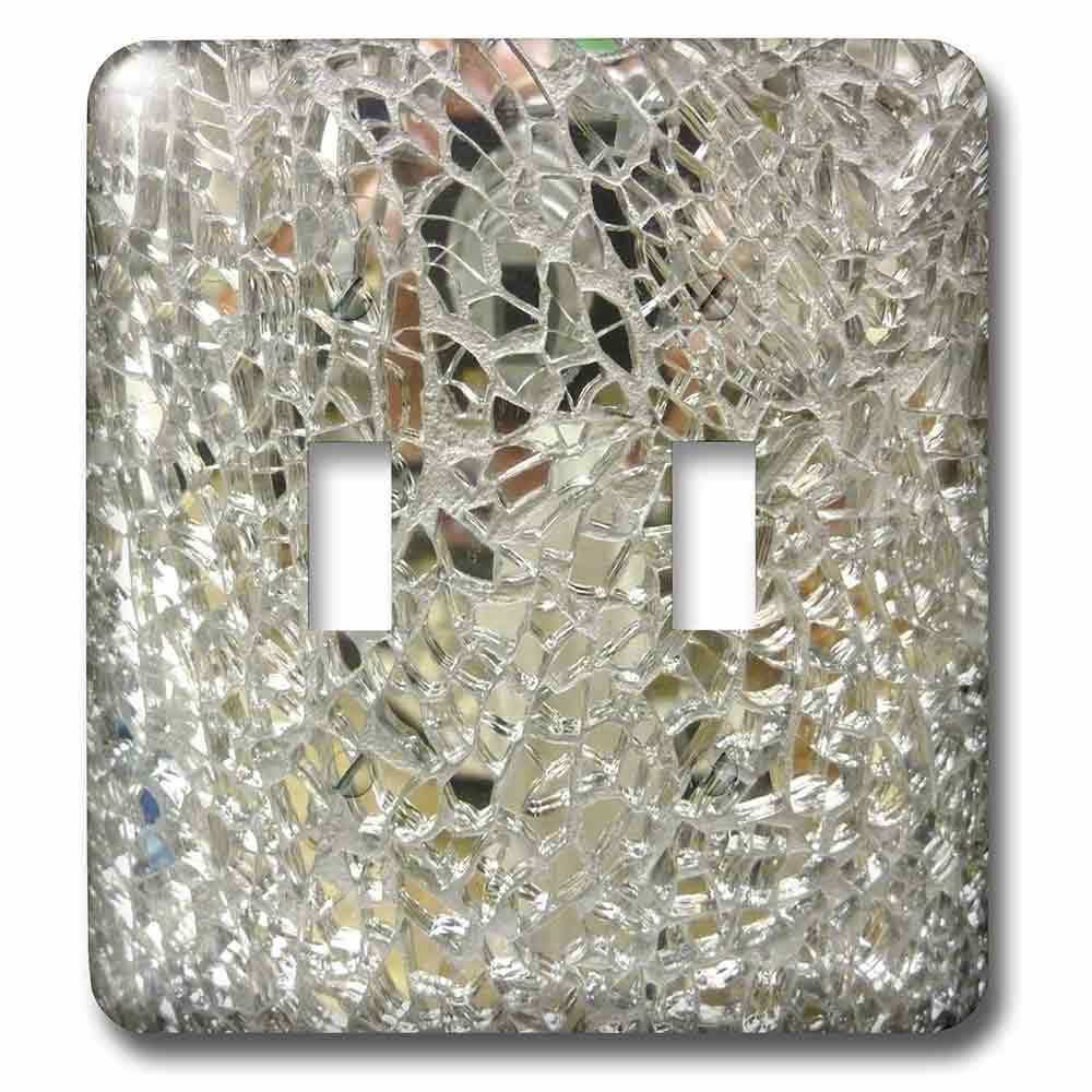 Double Toggle Wall Plate With Image Of Mirror Glass Closeup