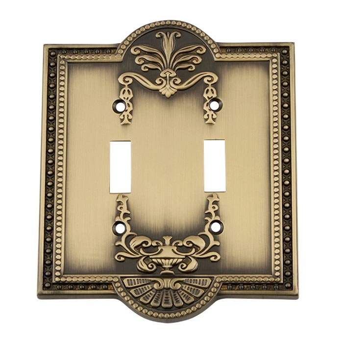 Double Toggle Switchplate in Antique Brass